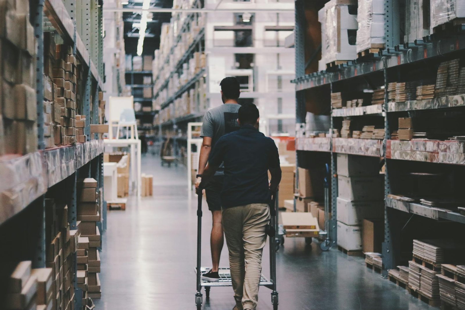 https://www.pexels.com/photo/men-going-around-a-warehouse-1797428/